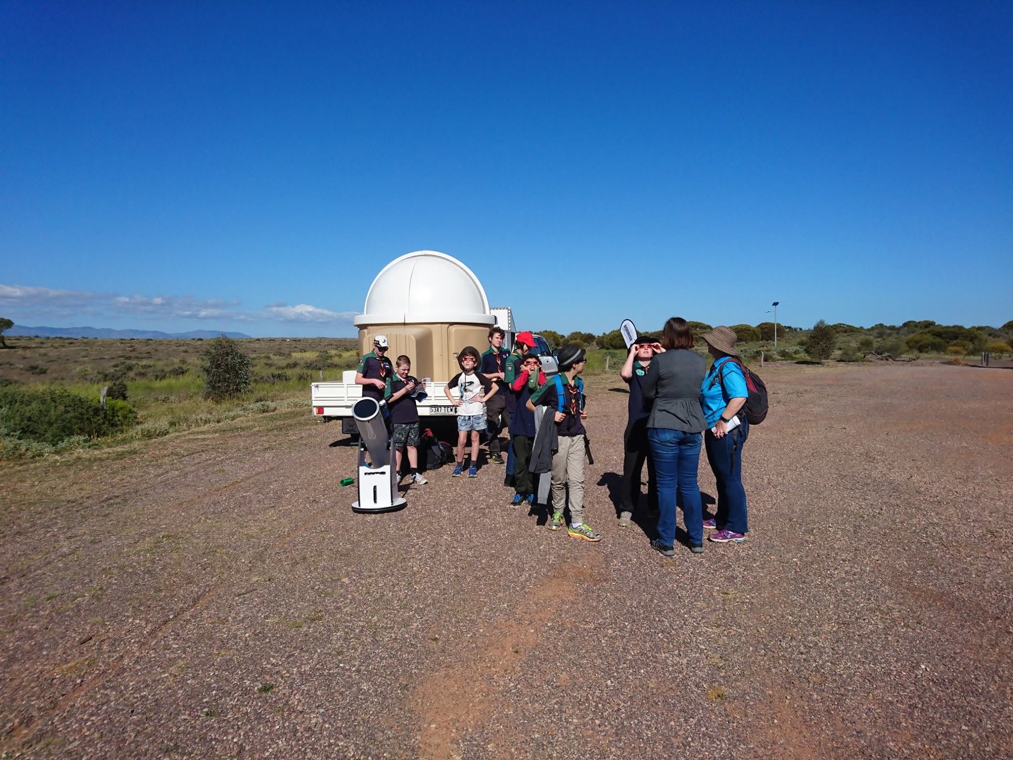 (From original post) People enjoying the perfect view of Sun through 200mm Dobsonian with white light filter, and the giveaway solar glassed by CBSAP Australia. Special thanks to them !