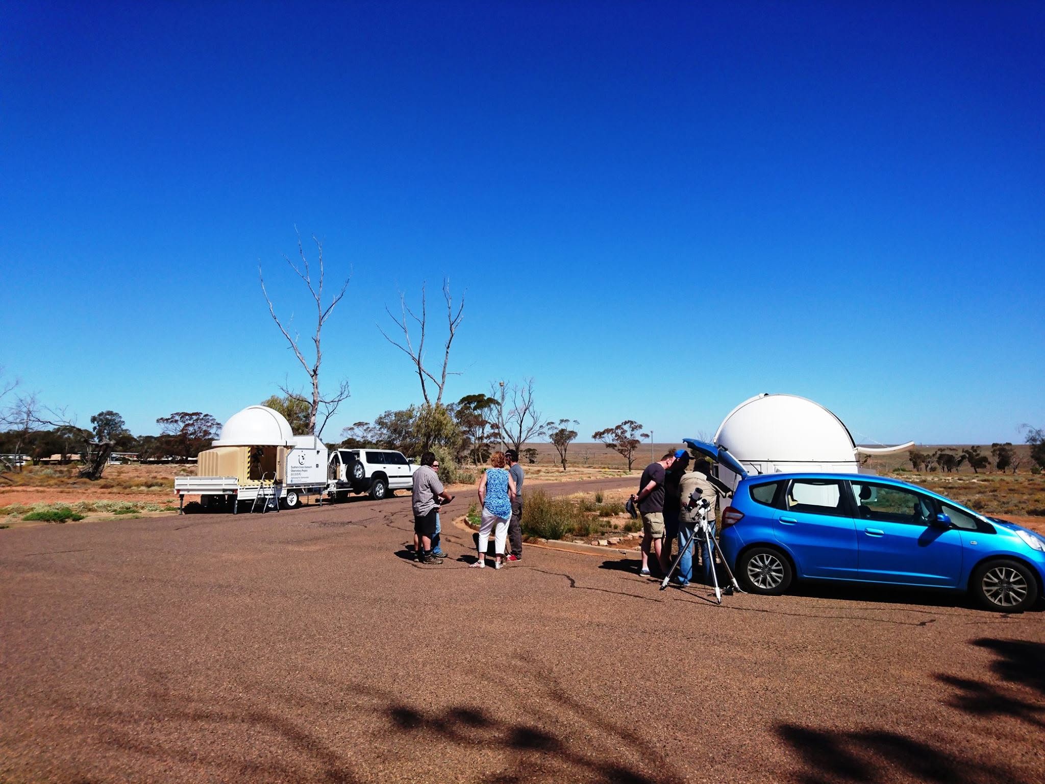 At Woomera-Baker Observatory. People gathered around Padraic's H-Alpha solar telescope with great views of solar filaments and prominences.